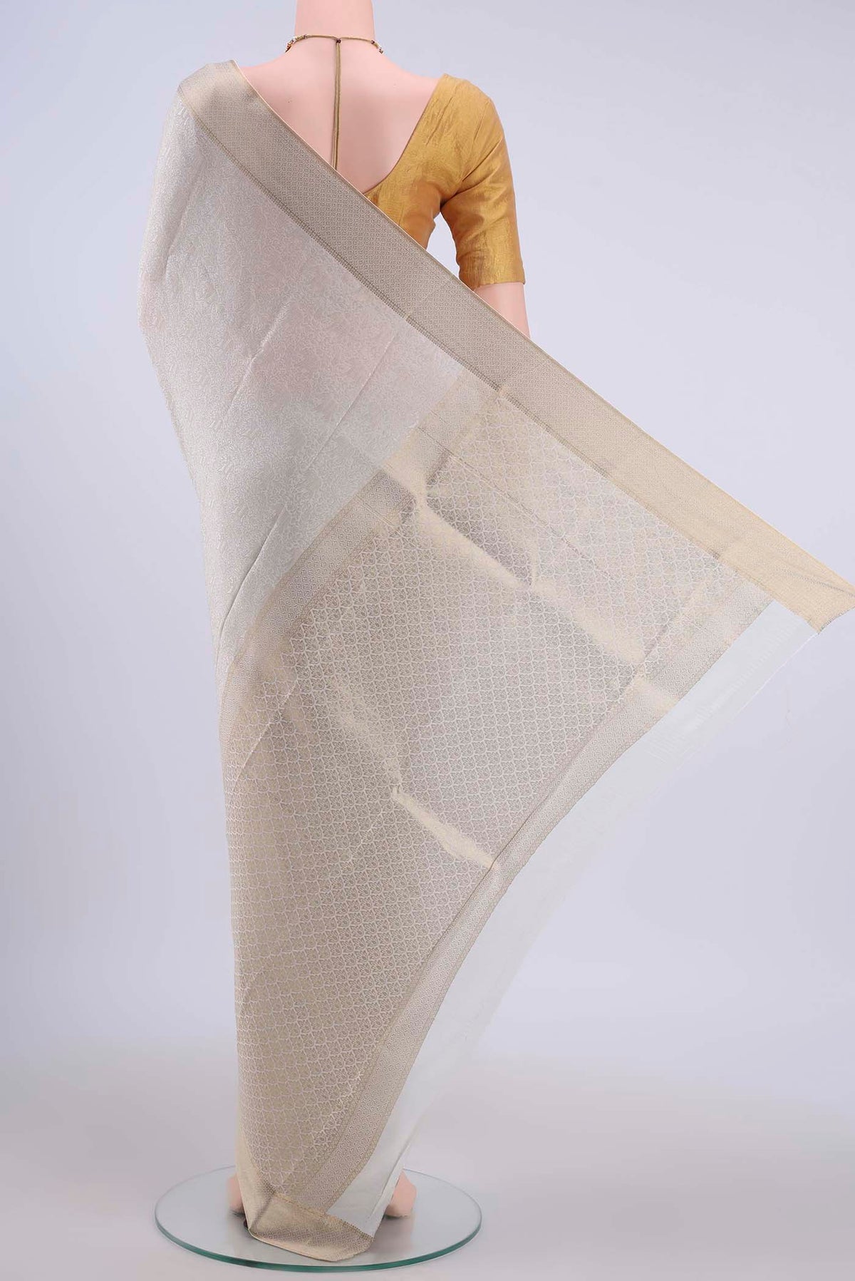 Flat view of Off White Mysore Crepe Saree with Zari Brocade on the body and Zari Border