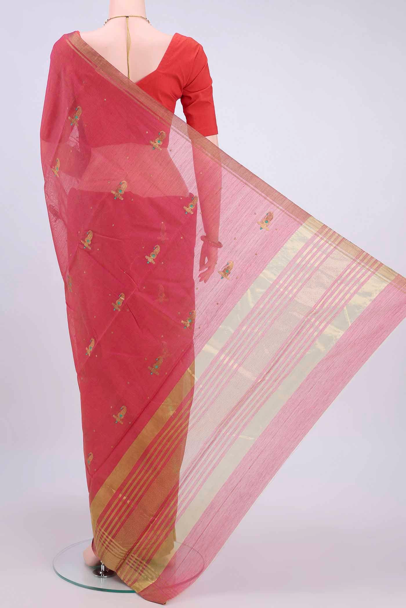 Flat view of Coral Chanderi Silk Cotton Saree with Zari Butta on the body and Zari Border