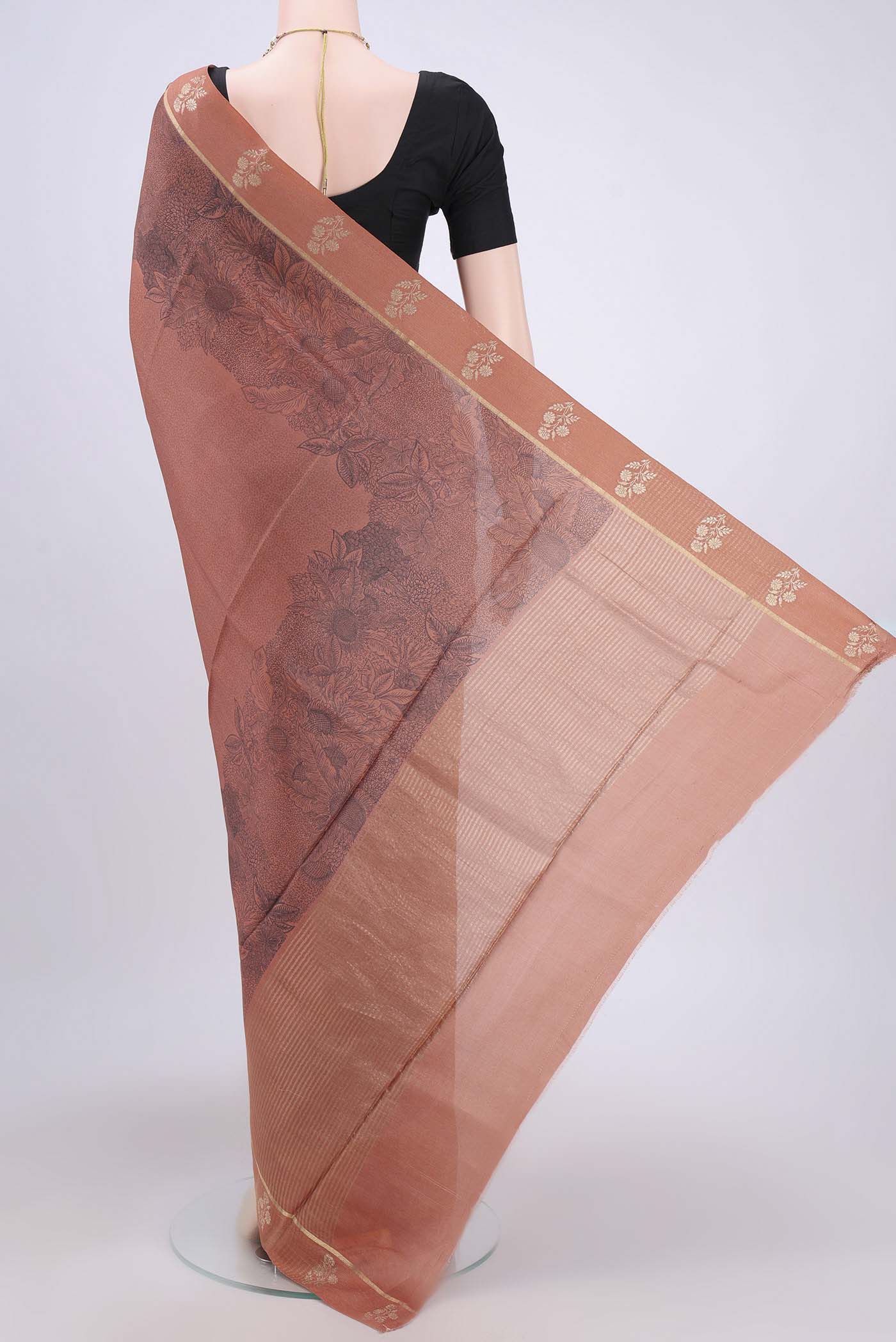 Flat view of Brown Dual Tone Tussar Silk Saree with Printed design on the body and Zari And Thread Border. 