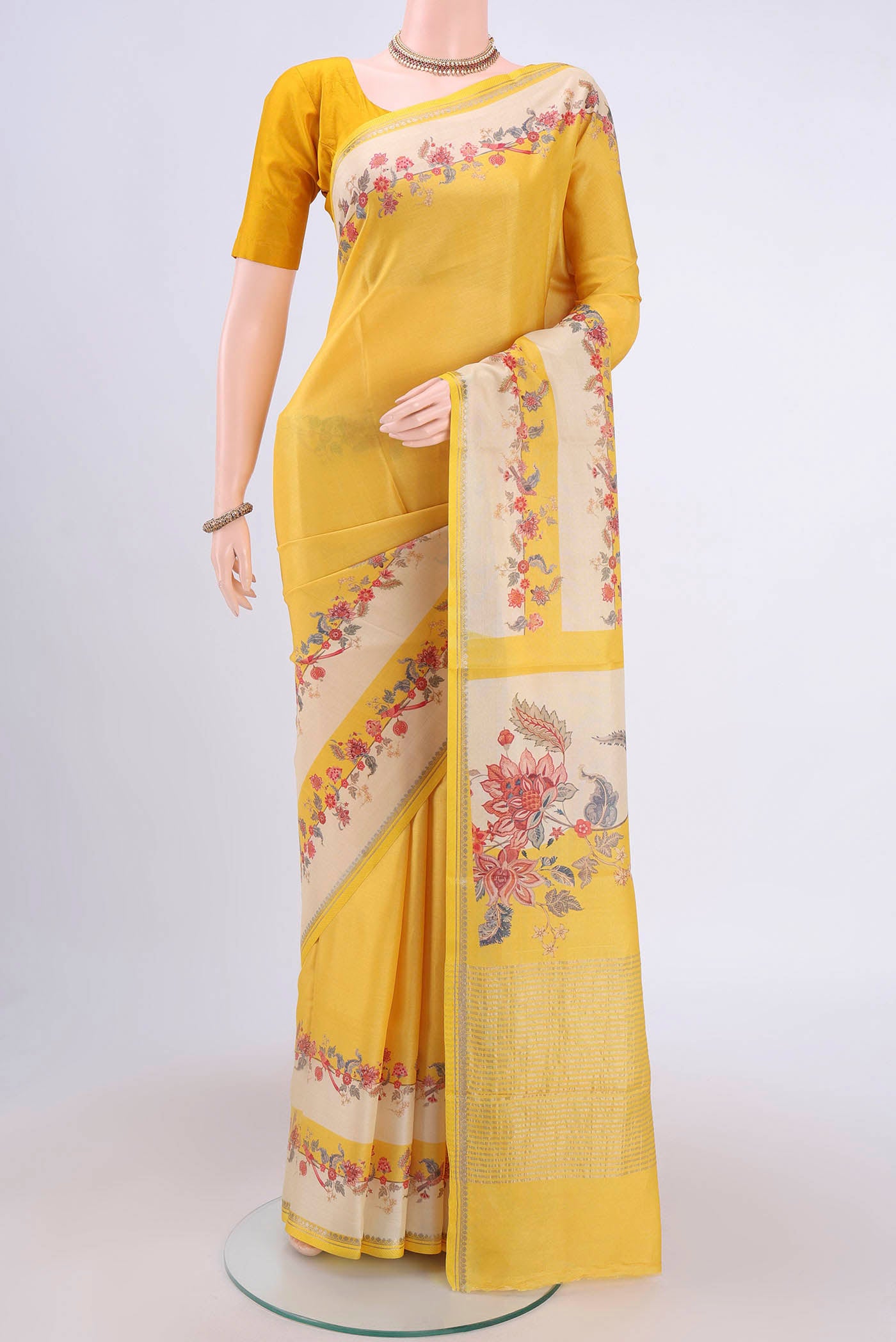 Lemon Yellow Dual Tone Tussar Silk Saree with Printed design on the body and Printed Border.  displayed on a mannequin