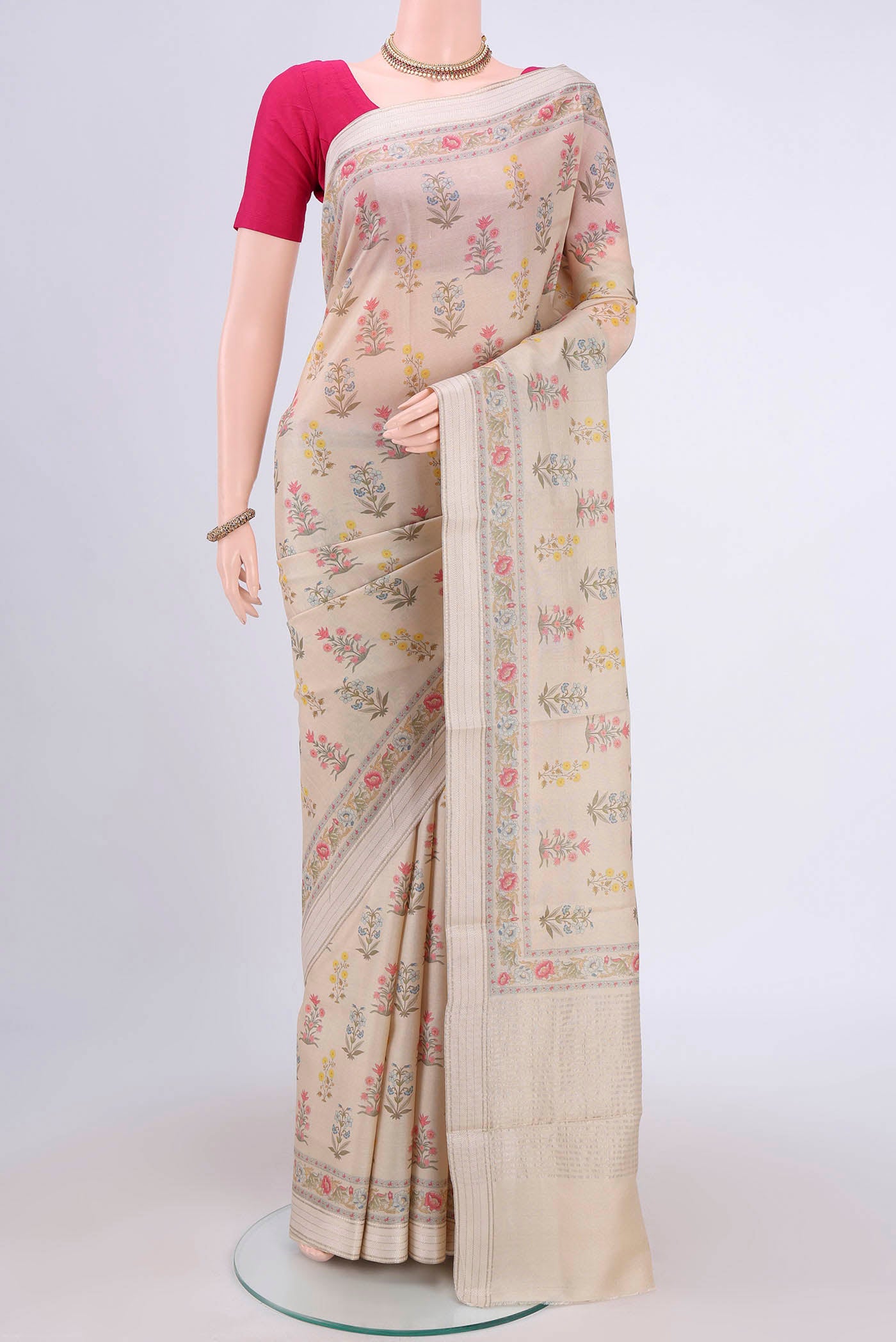 Beige Dual Tone Tussar Silk Saree with Printed design on the body and Printed Border.  displayed on a mannequin
