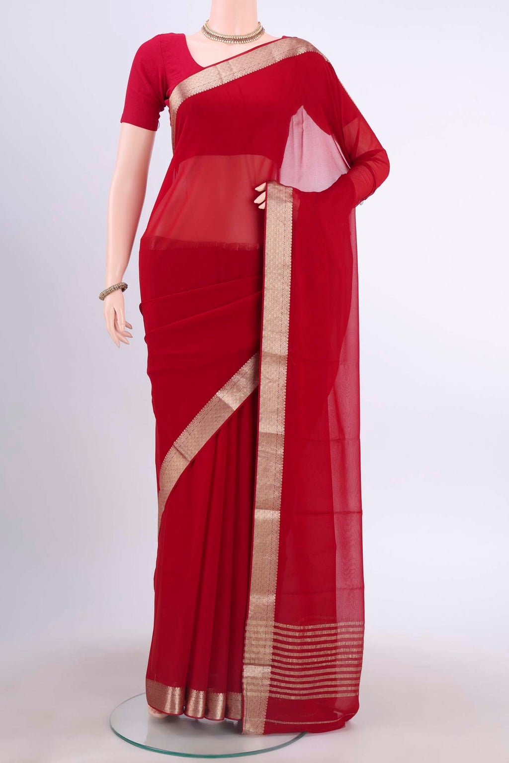 Red Mysore Georgette Saree with Plain Body and Zari Border displayed on a mannequin