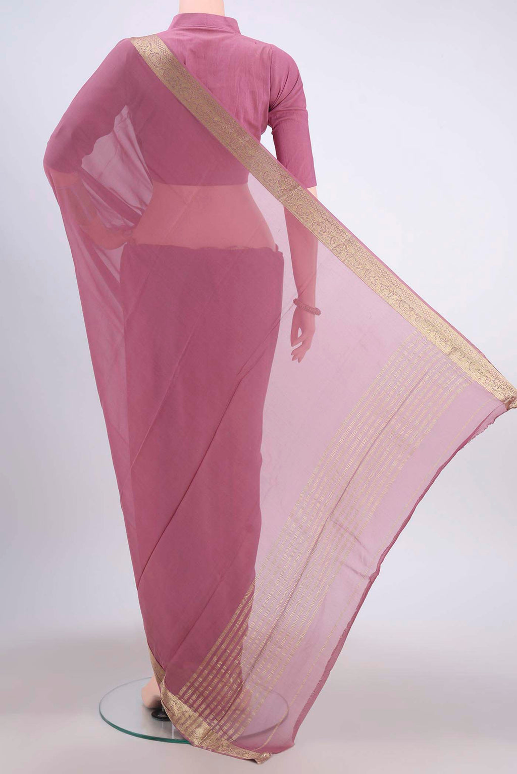 Flat view of Light Magenta Mysore Georgette Saree with Plain Body and Zari Border