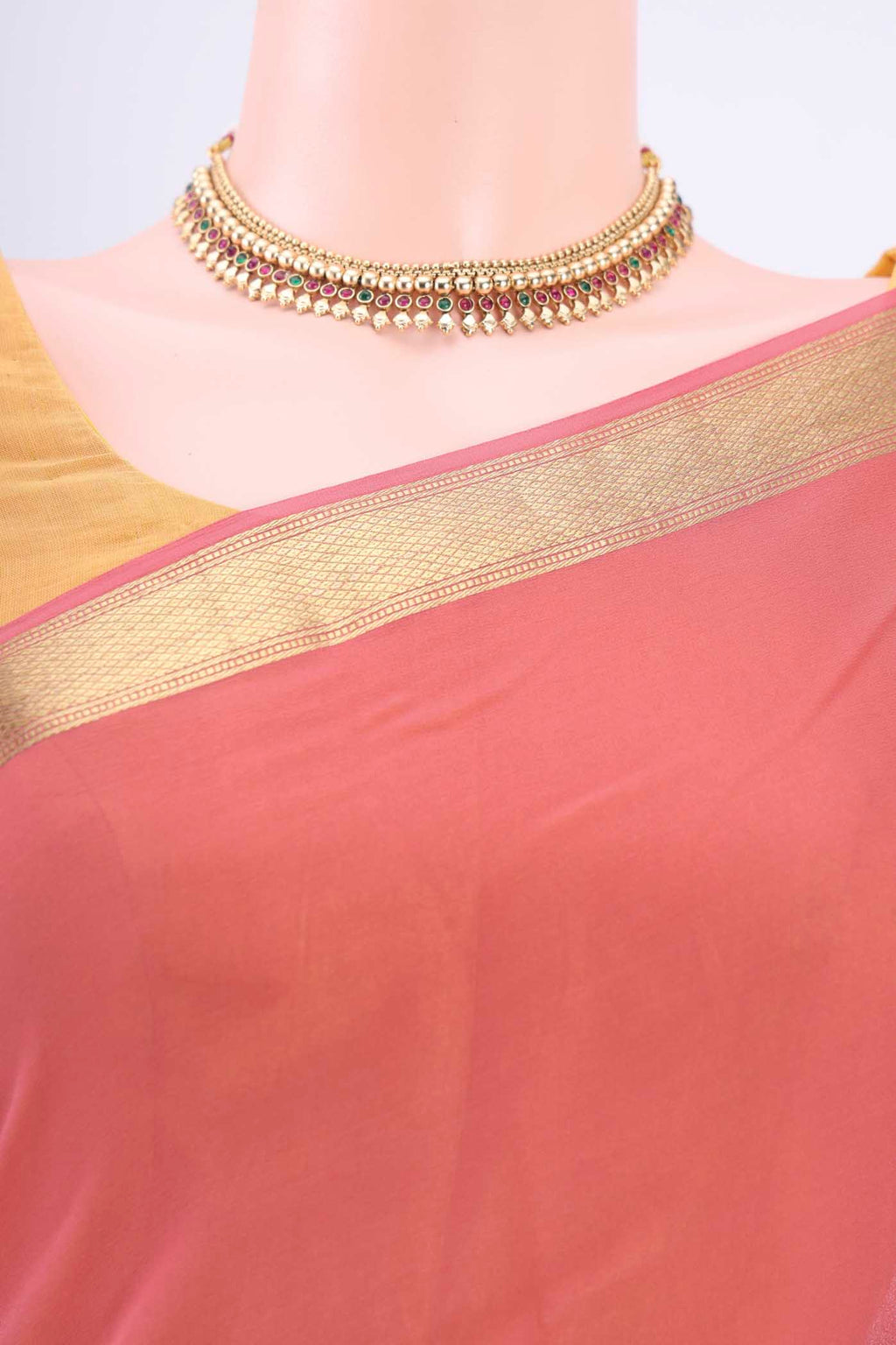 Border image of Peach Mysore Georgette Saree with Plain Body and Zari Border