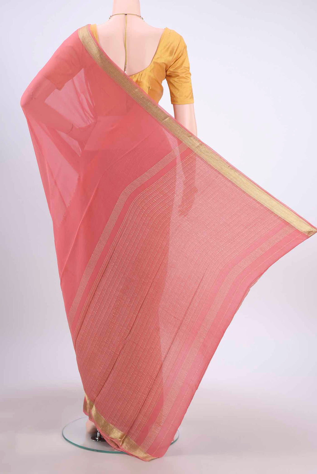 Flat view of Peach Mysore Georgette Saree with Plain Body and Zari Border