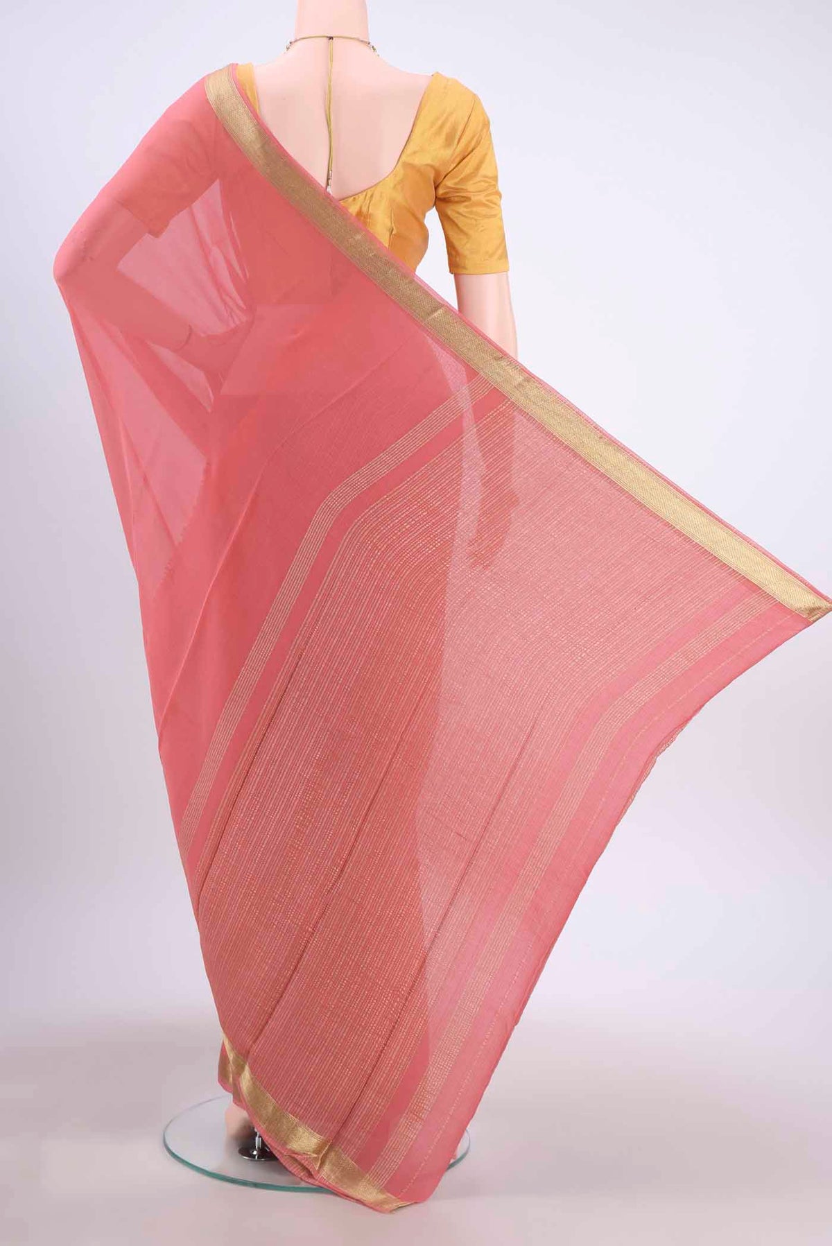 Flat view of Peach Mysore Georgette Saree with Plain Body and Zari Border