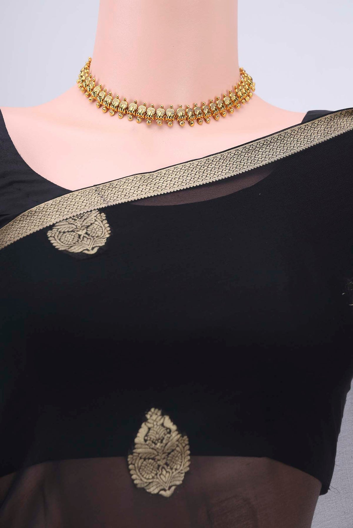 Border image of Black Mysore Georgette Saree with Zari Butta on the body and Zari Border