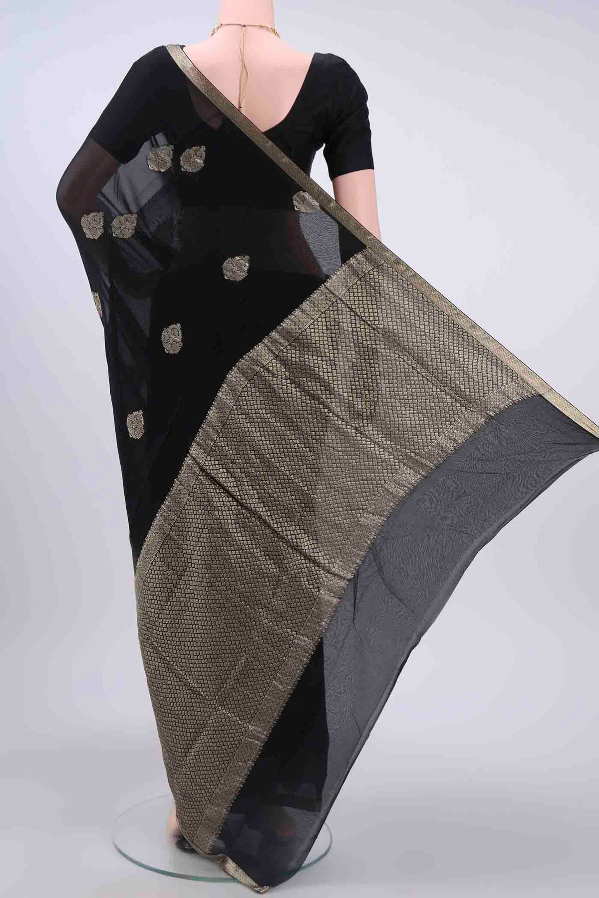 Flat view of Black Mysore Georgette Saree with Zari Butta on the body and Zari Border