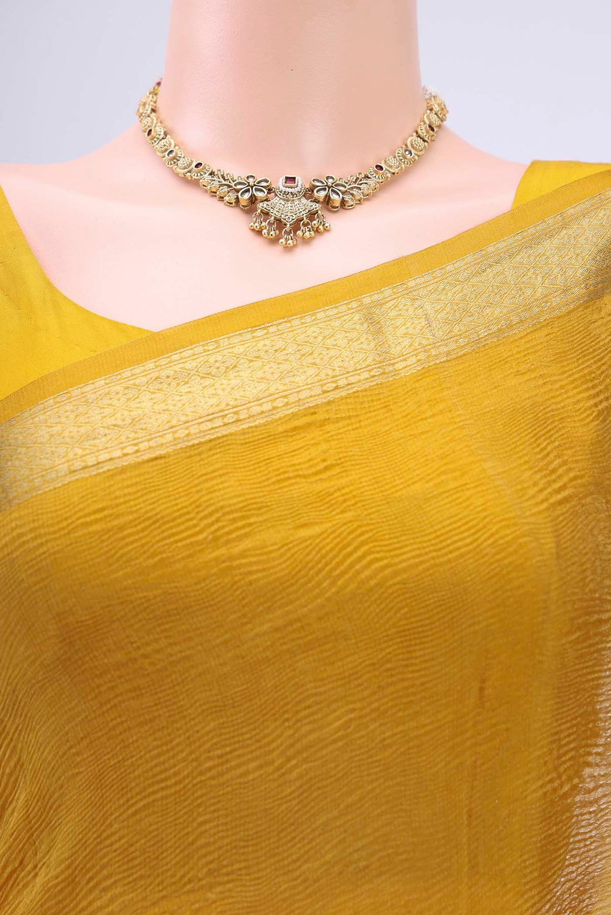 Border image of Mustard Mysore Chiffon Saree with Plain Body and Zari Border