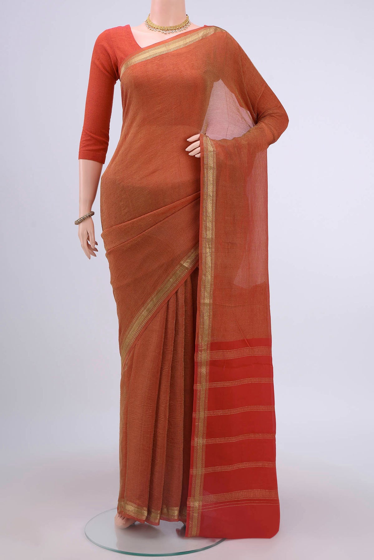 Red Mysore Chiffon Saree with Plain Body and Zari Border displayed on a mannequin