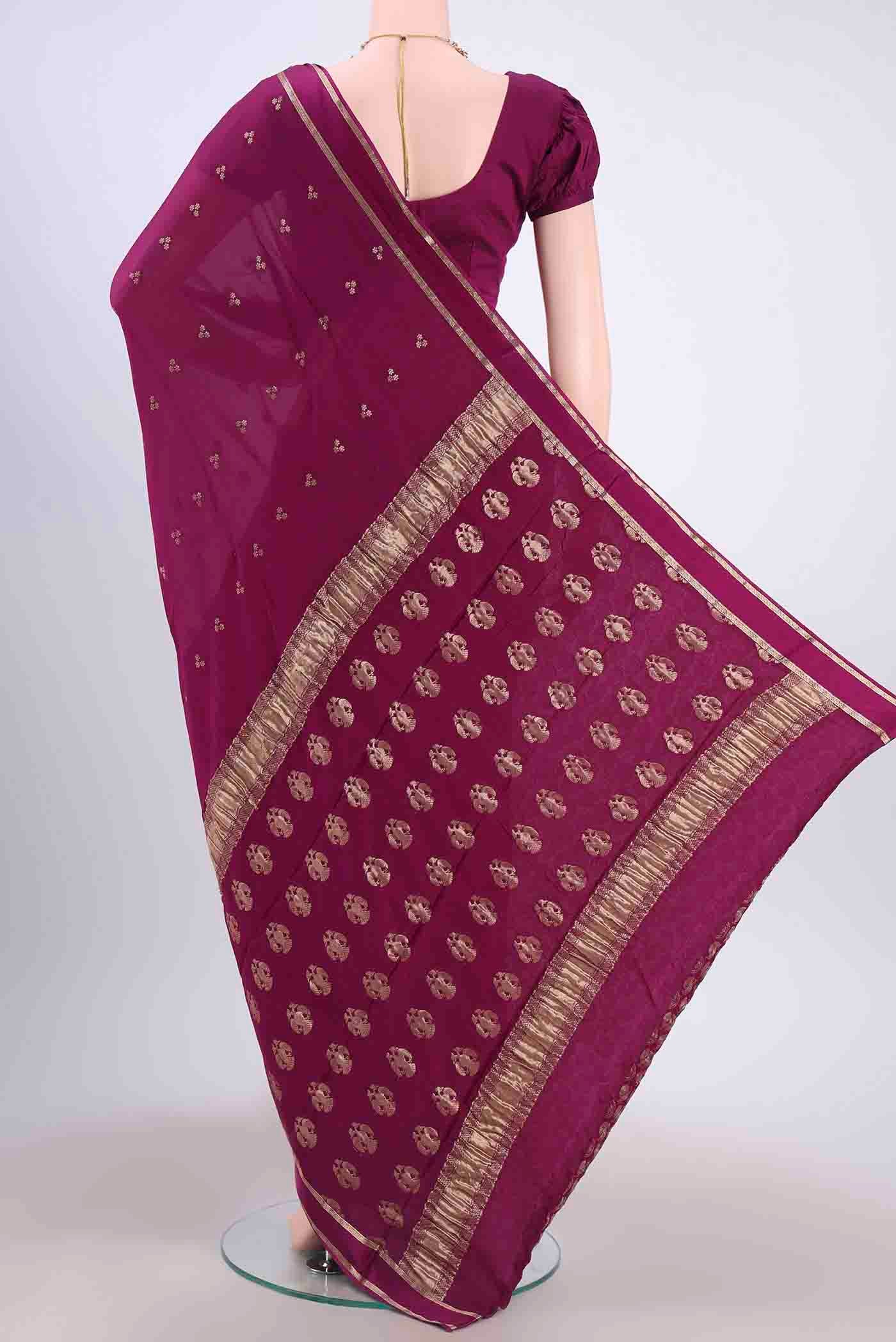 Flat view of Magenta Mysore Crepe Saree with Zari Butta on the body and Satin Border