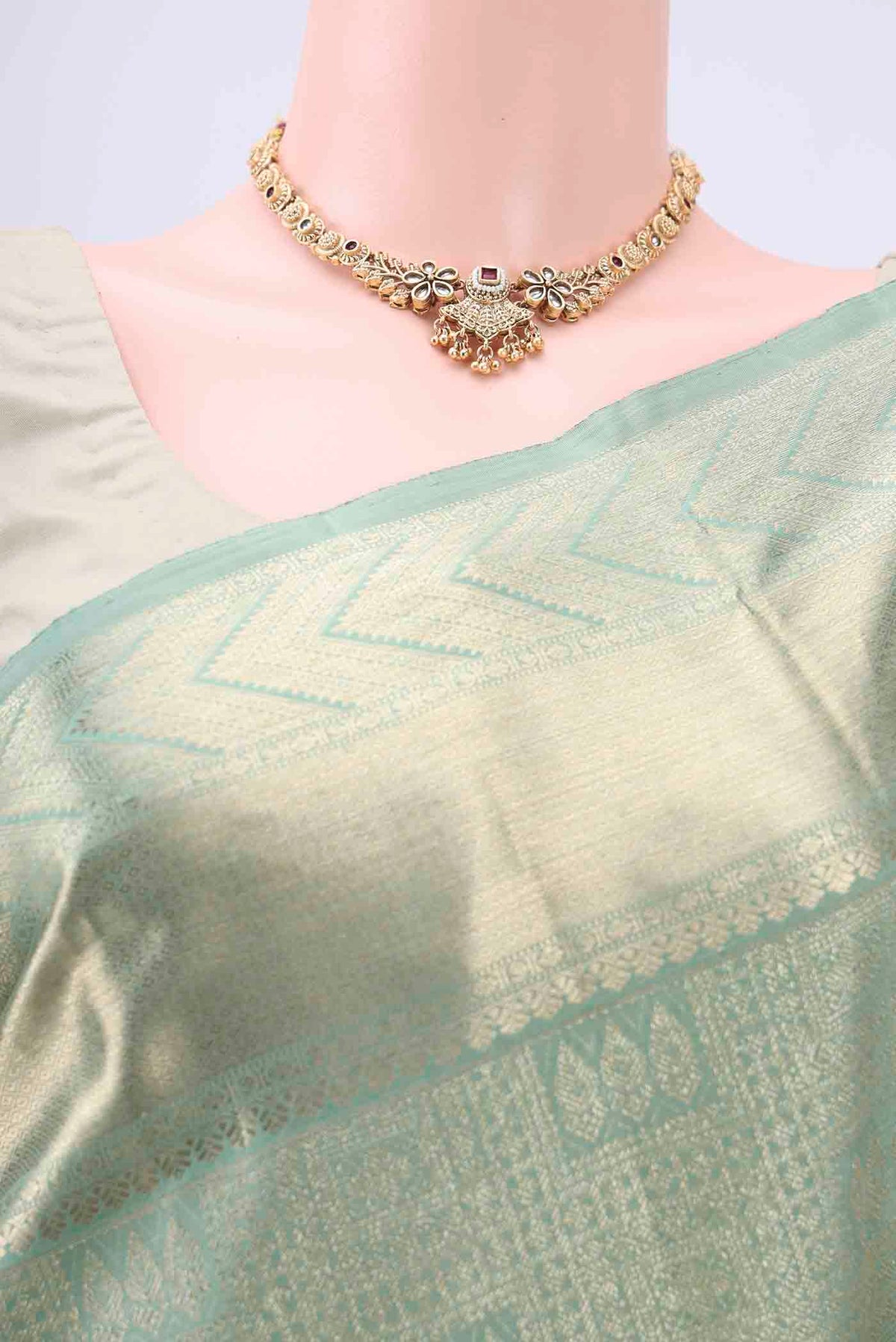 Border image of Grey Kanchipuram Silk Saree with Zari Brocade on the body and Zari Border