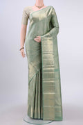 Grey Kanchipuram Silk Saree with Zari Brocade on the body and Zari Border displayed on a mannequin