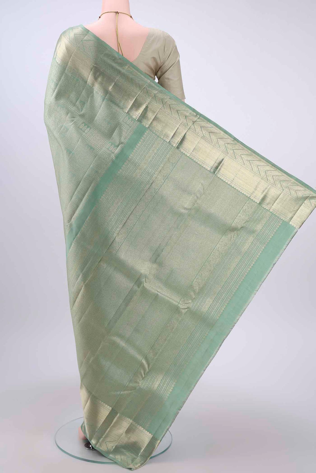 Flat view of Grey Kanchipuram Silk Saree with Zari Brocade on the body and Zari Border