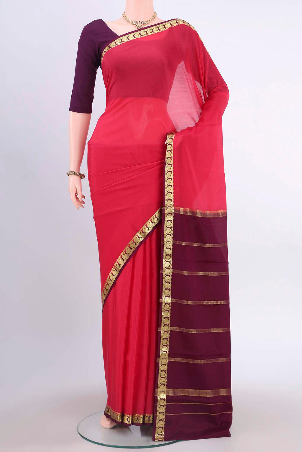 Dark Pink Mysore Crepe Saree with Plain Body and Zari Border displayed on a mannequin