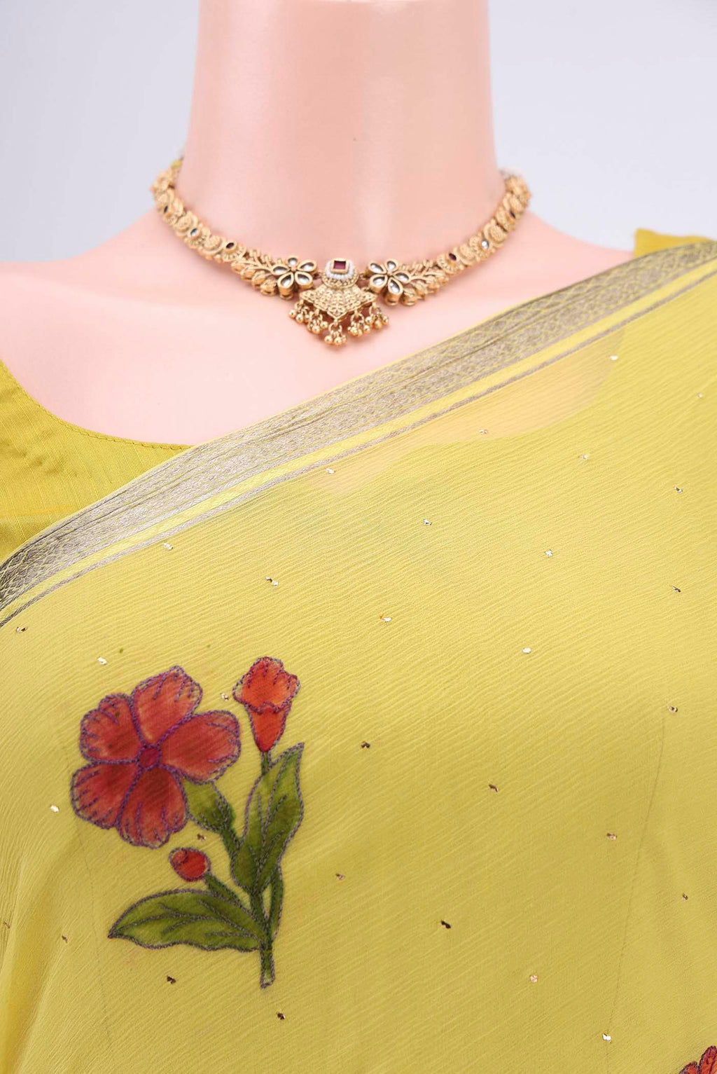 Border image of Lemon Yellow Mysore Chiffon Saree with Printed design on the body and Zari Border. 