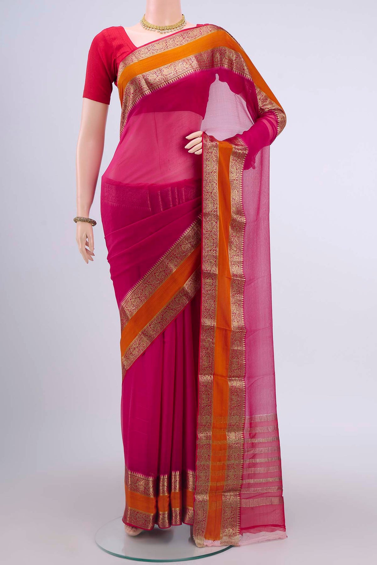 Dark Pink Mysore Chiffon Saree with Plain Body and Zari Border displayed on a mannequin