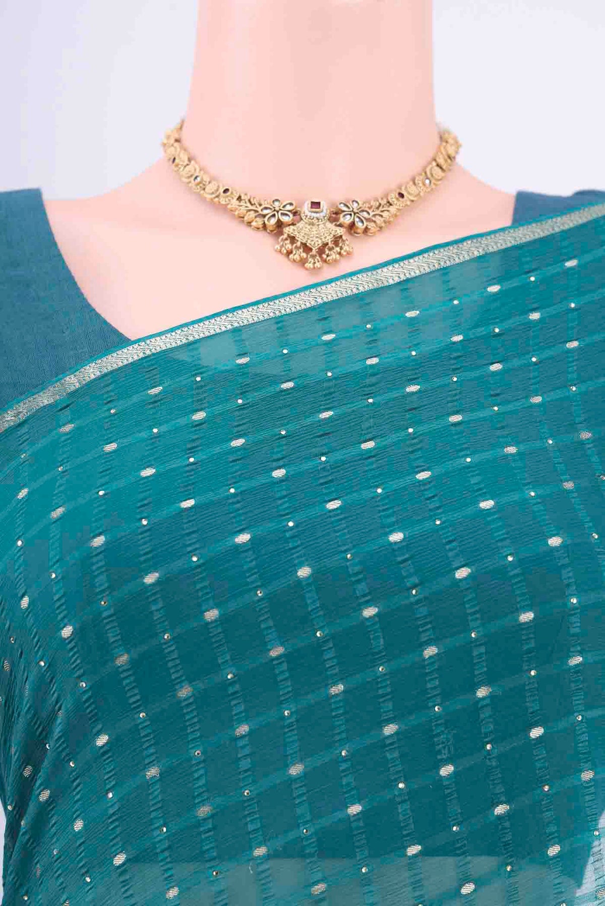 Border image of Turquoise Mysore Chiffon Saree with Checked design on the body and Thin Zari Line