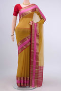 Mustard Mysore Chiffon Saree with Plain Body and Zari Border displayed on a mannequin
