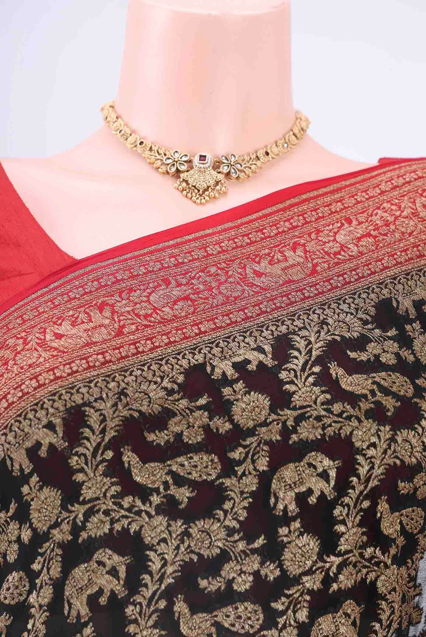 Border image of Black Banarasi Georgette Saree with Zari Brocade on the body and Zari Border