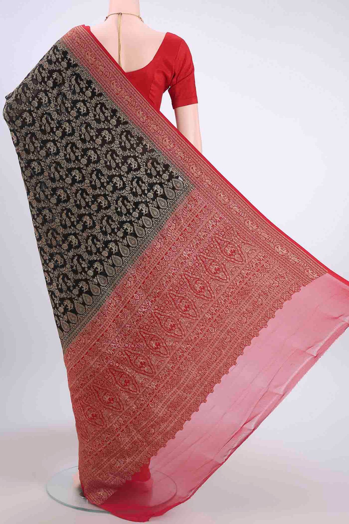 Flat view of Black Banarasi Georgette Saree with Zari Brocade on the body and Zari Border
