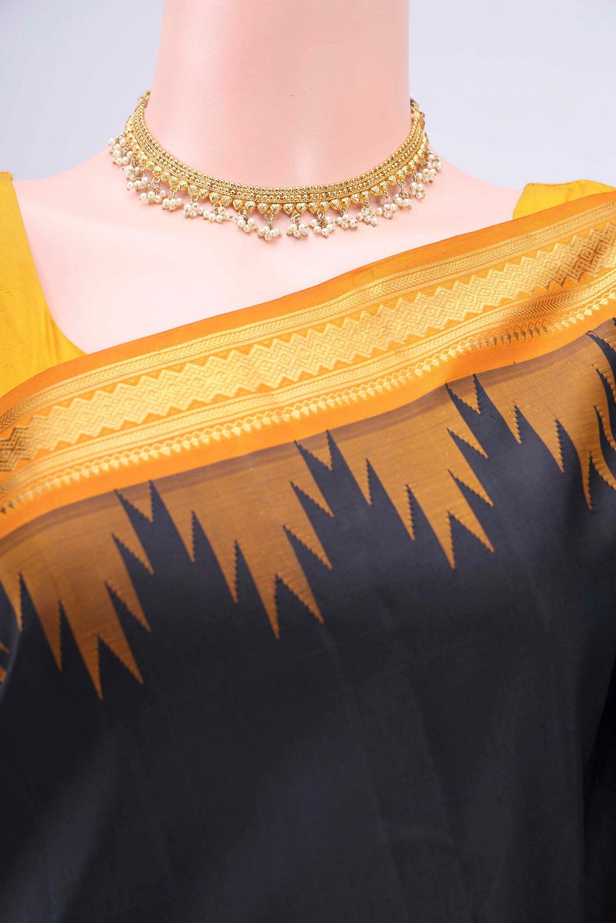 Border image of Pure Silk Pure Zari Black Kanchipuram Saree with Plain Body and Zari Border