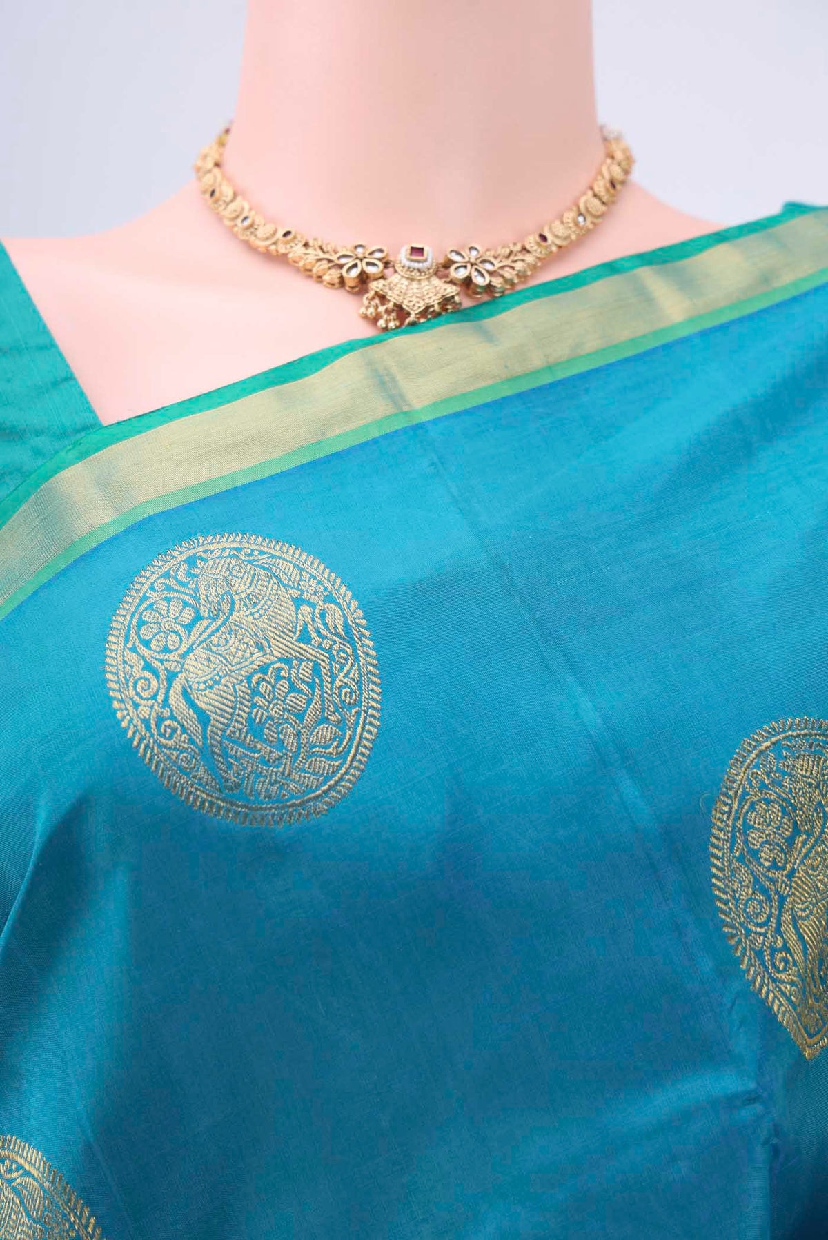 Border image of Blue Kanchipuram Silk Saree with Zari Butta on the body and Zari Border