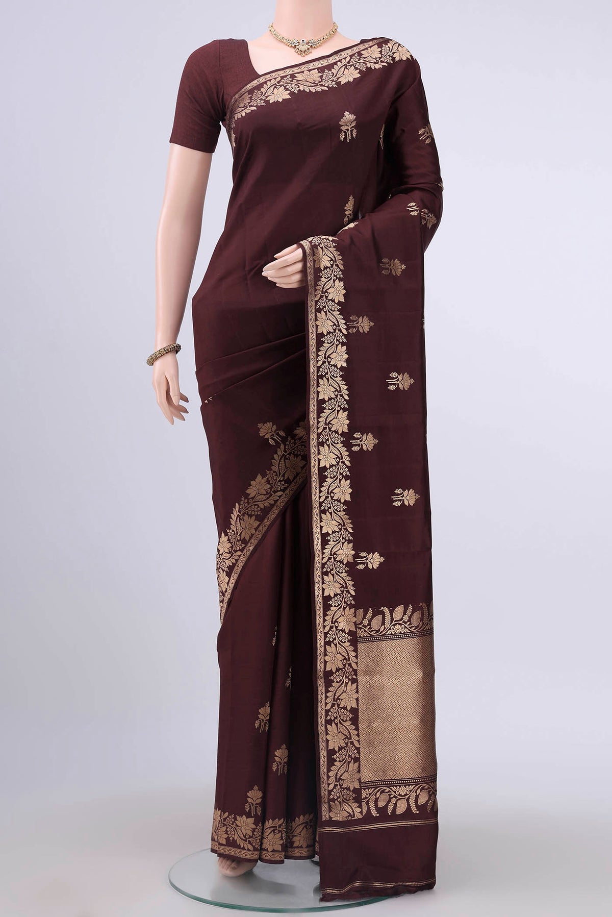 Brown Dual Tone Banarasi Katan Silk Saree with Zari Butta on the body and Plain Border displayed on a mannequin