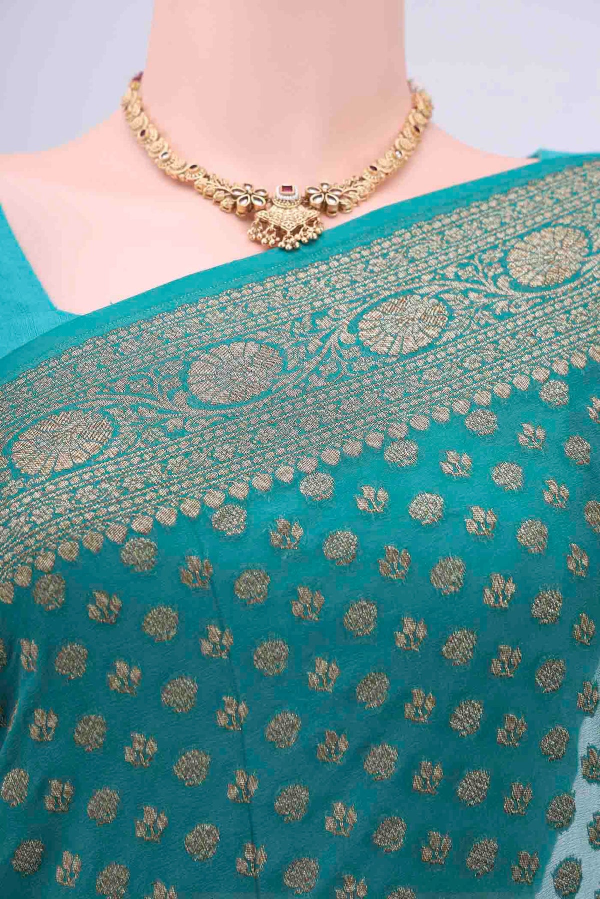 Border image of Sea Green Banarasi Georgette Saree with Zari Brocade on the body and Zari Border