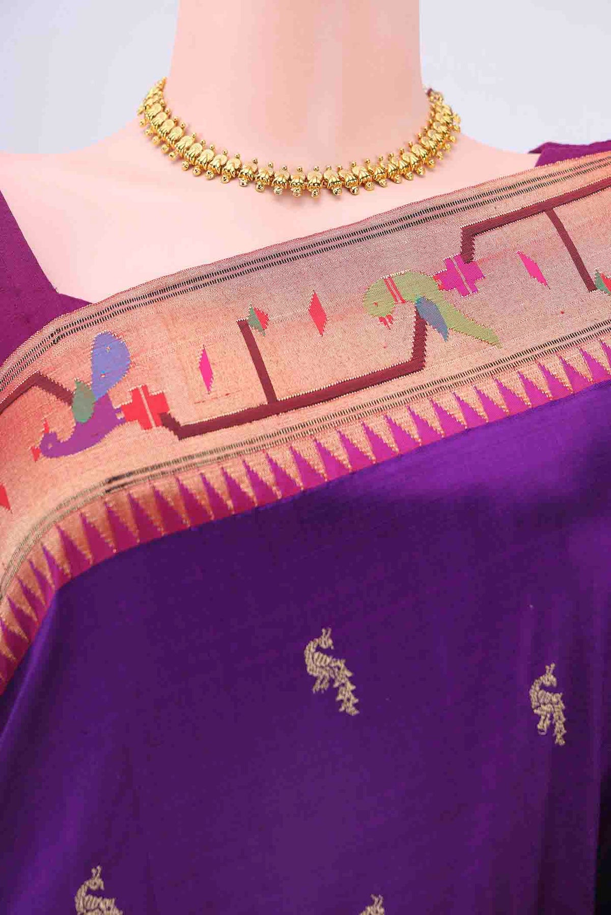 Border image of Purple Paithani Silk Saree with Zari Butta on the body and Zari Border