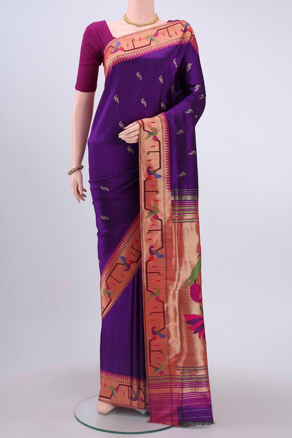 Purple Paithani Silk Saree with Zari Butta on the body and Zari Border displayed on a mannequin