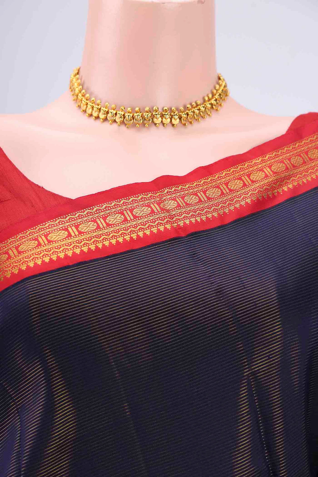 Border image of Navy Blue Kanjivaram Saree with Stripes on the body and Temple Border. 