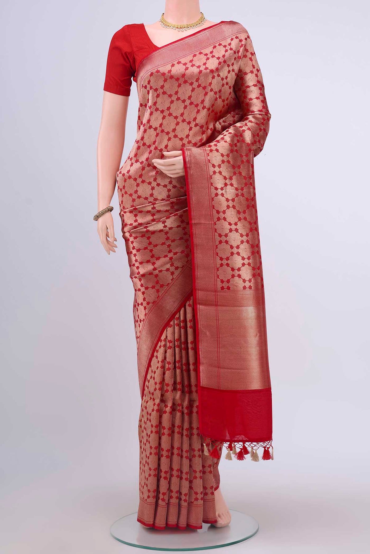 Red Dual Tone Banarasi Silk Saree with Zari Brocade on the body and Zari Border displayed on a mannequin