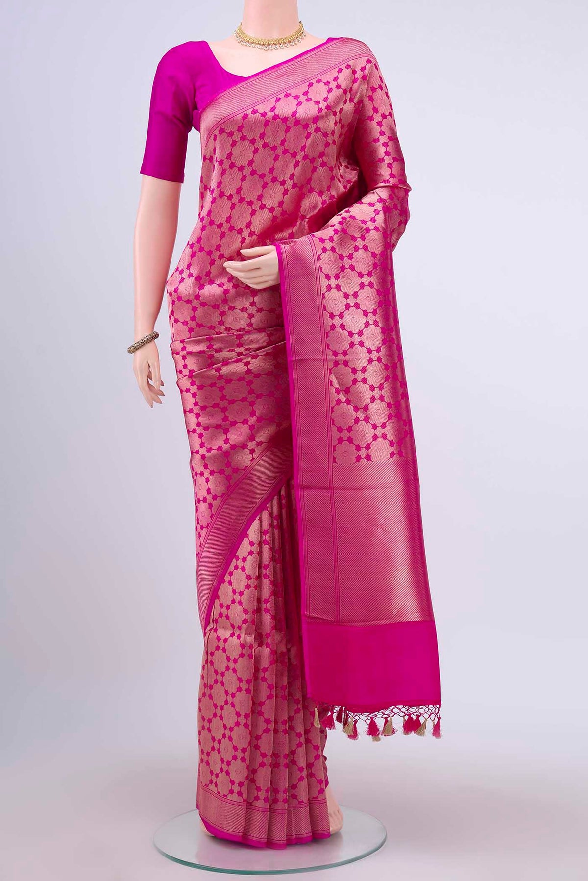 Rani Pink Dual Tone Banarasi Silk Saree with Zari Brocade on the body and Zari Border displayed on a mannequin