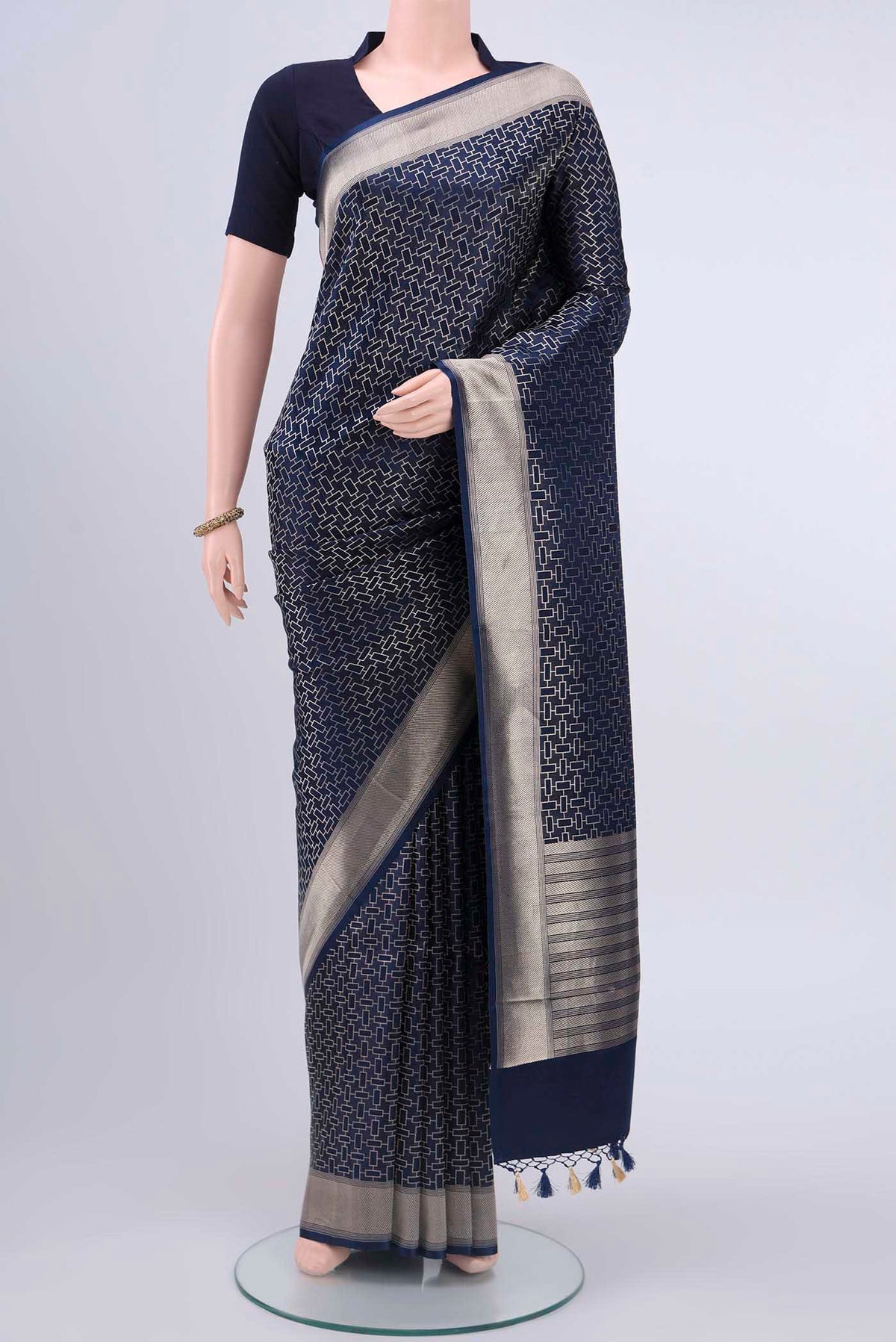 Navy Blue Dual Tone Banarasi Silk Saree with Zari Brocade on the body and Zari Border displayed on a mannequin
