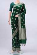 Bottle Green Dual Tone Banarasi Silk Saree with Zari Butta on the body and Zari Border displayed on a mannequin