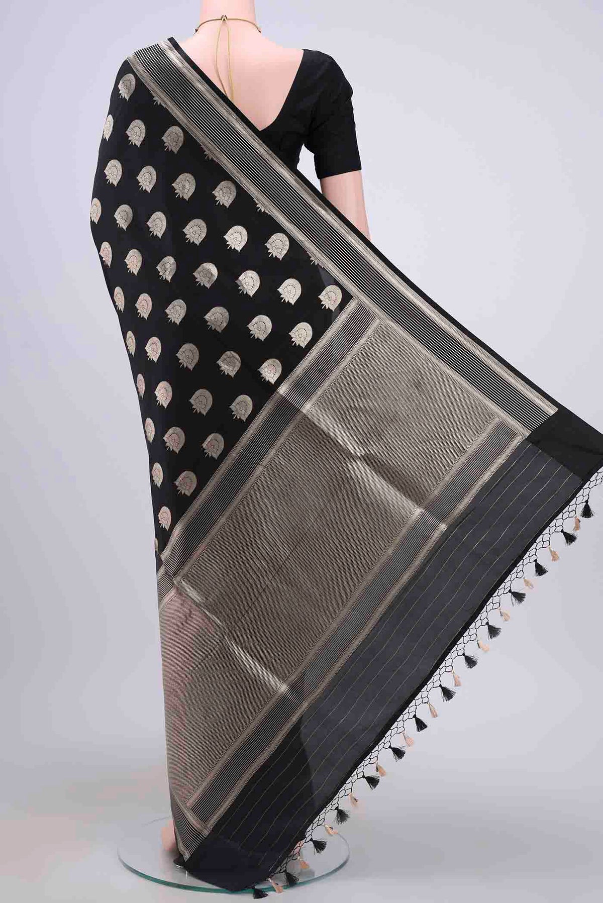 Flat view of Black Dual Tone Banarasi Silk Saree with Zari Butta on the body and Zari Border