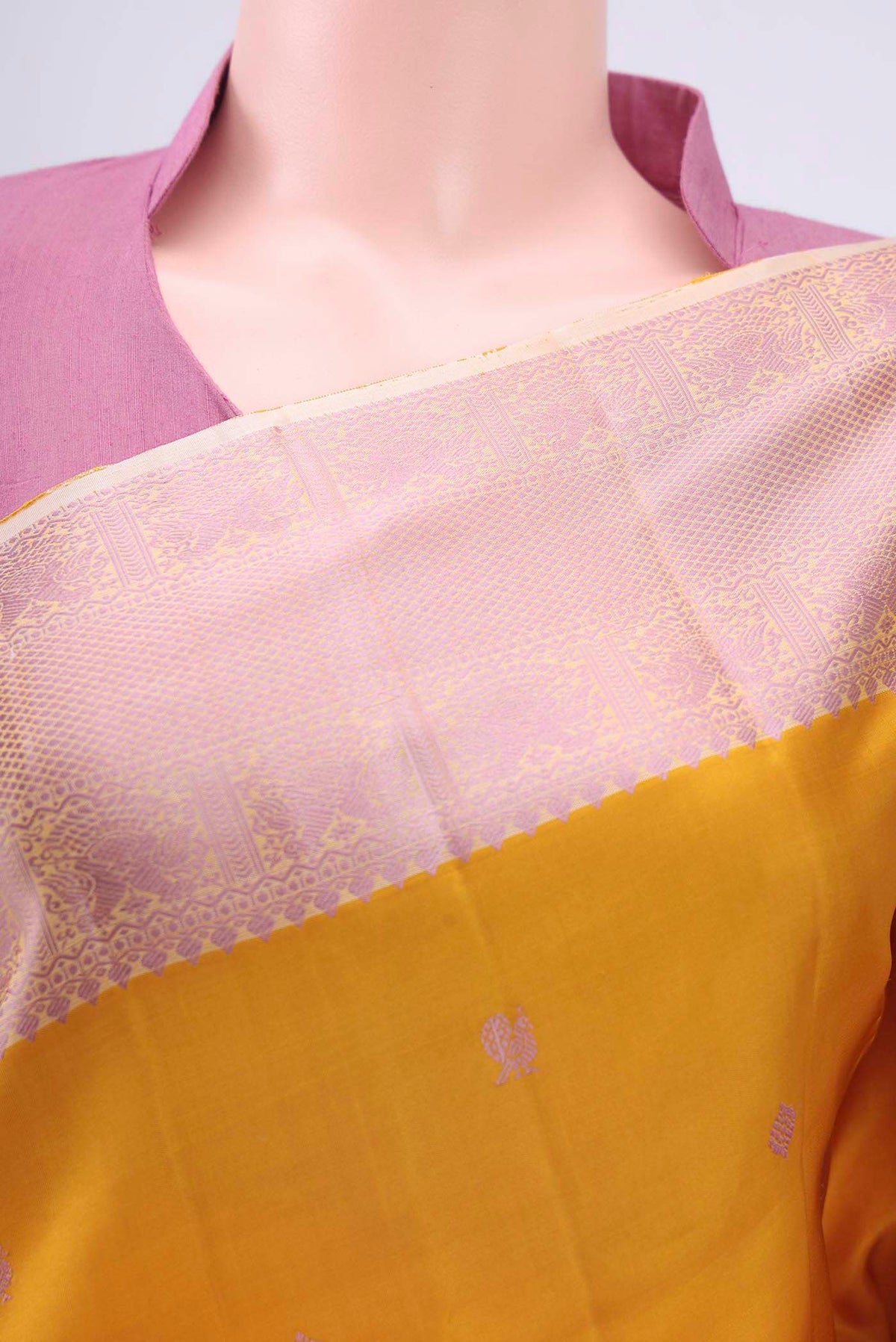 Border image of Yellow Kanchipuram Silk Saree with Thread Butta on the body and Thread Border