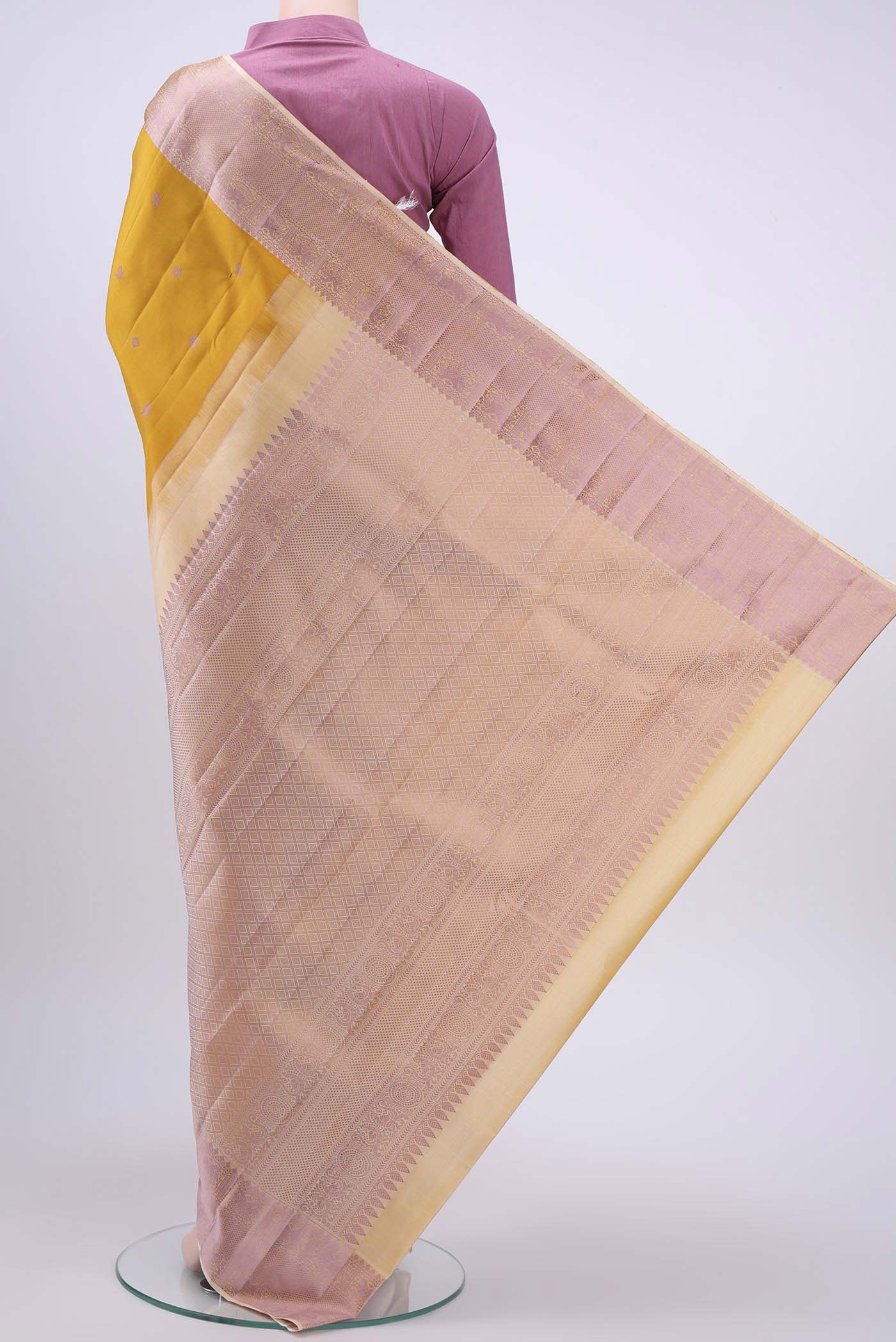 Flat view of Yellow Kanchipuram Silk Saree with Thread Butta on the body and Thread Border
