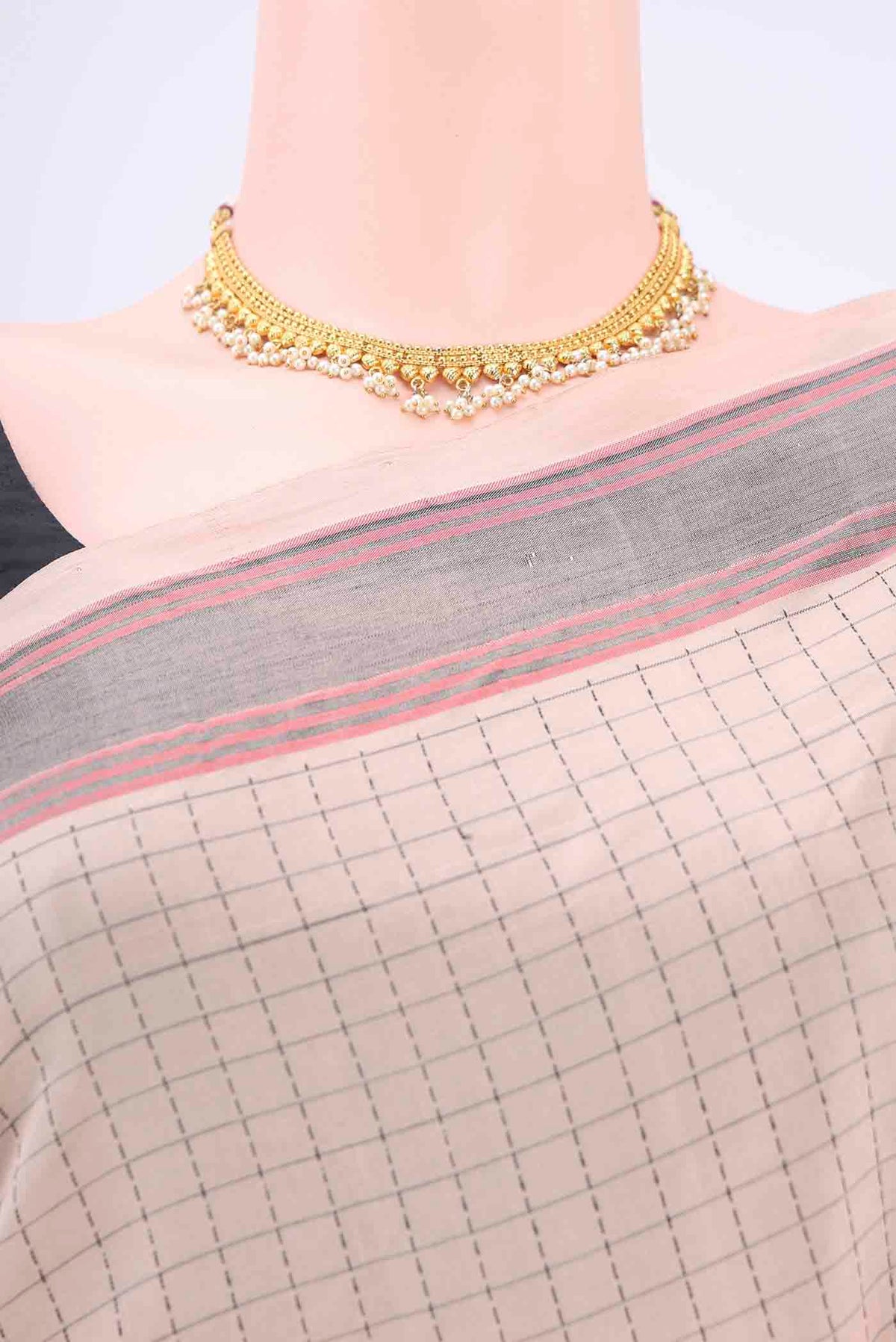 Border image of Beige Blended Poly Cotton Saree with Checked design on the body and Thread Border