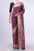 Violet Soft Silk Saree with Zari Brocade on the body and Zari Border displayed on a mannequin