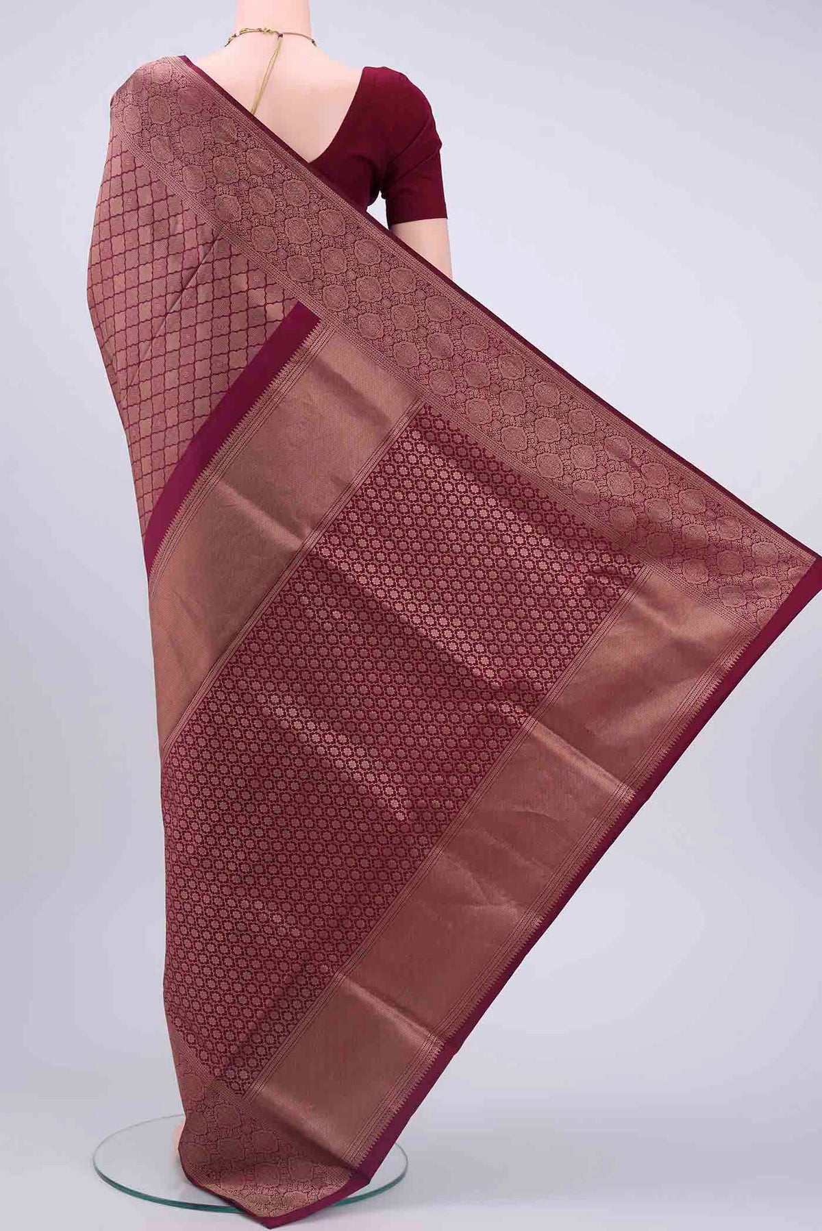 Flat view of Magenta Soft Silk Saree with Zari Brocade on the body and Zari Border