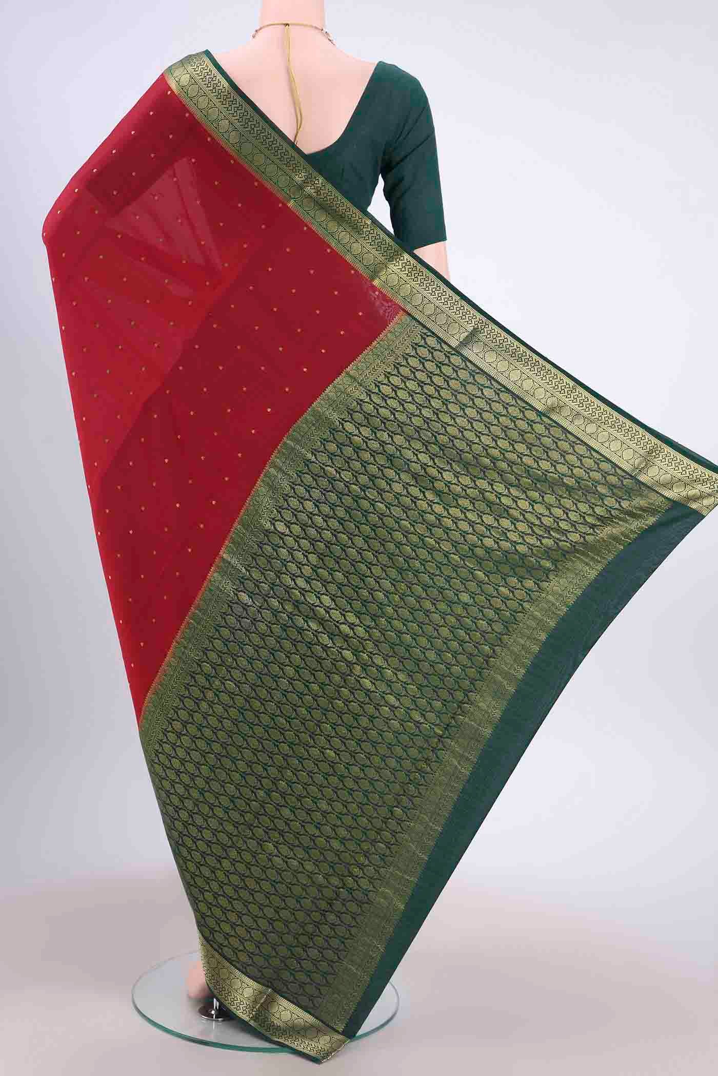 Flat view of Deep Red Mysore Crepe Saree with Zari Butta on the body and Zari Border