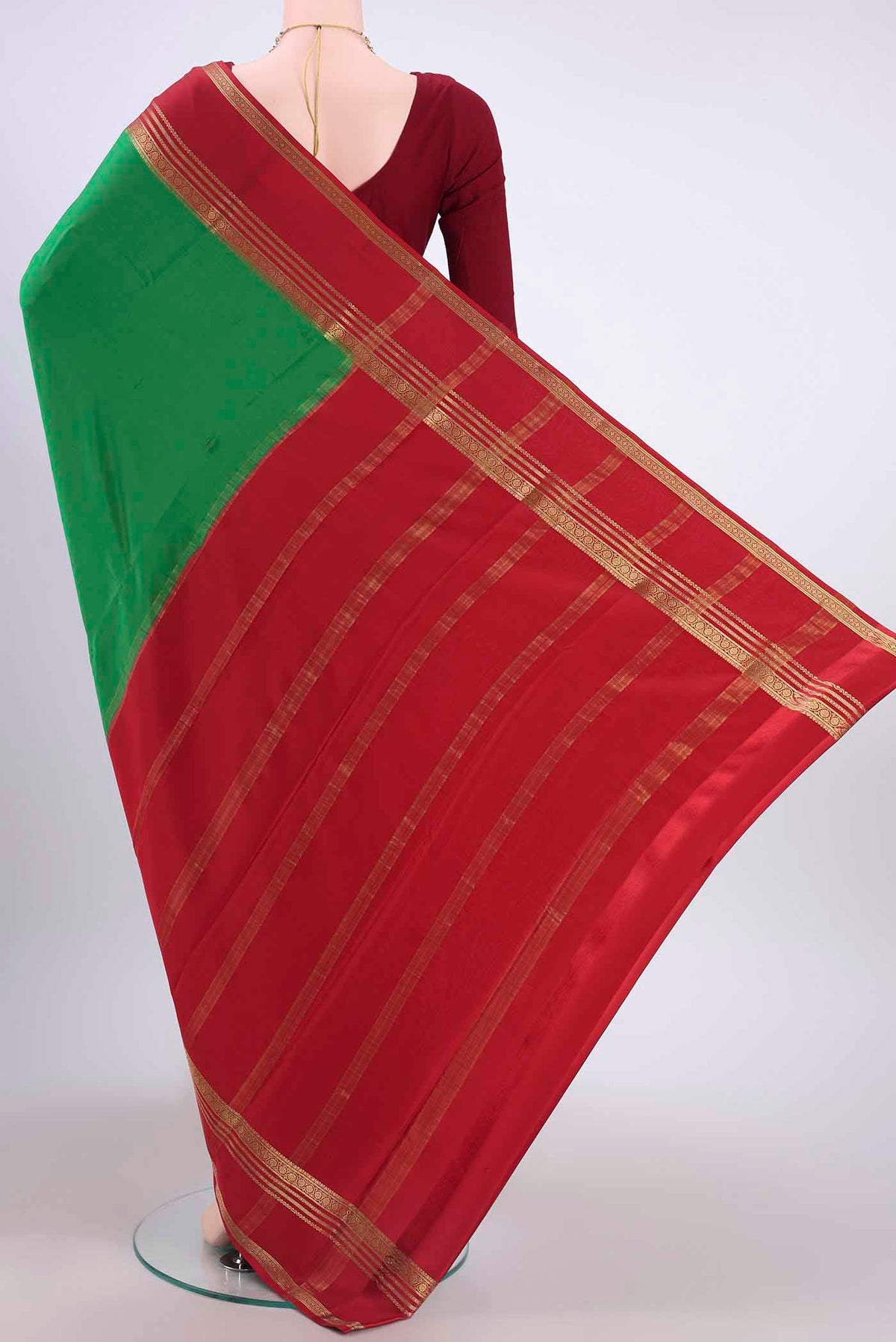 Flat view of Green Mysore Crepe Saree with Plain Body and Zari Border