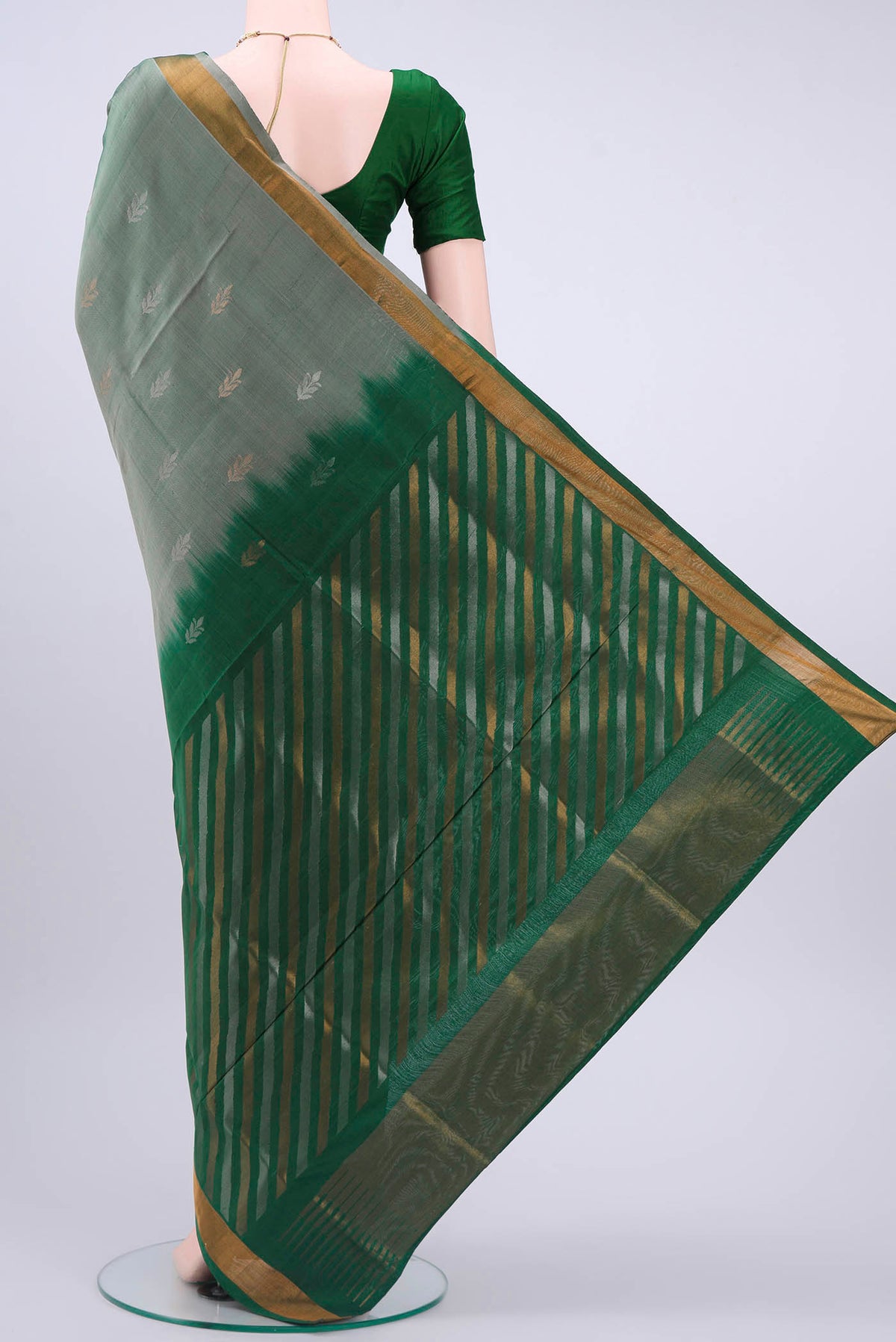 Flat view of Grey Uppada Silk Saree with Zari Butta on the body and Zari Border