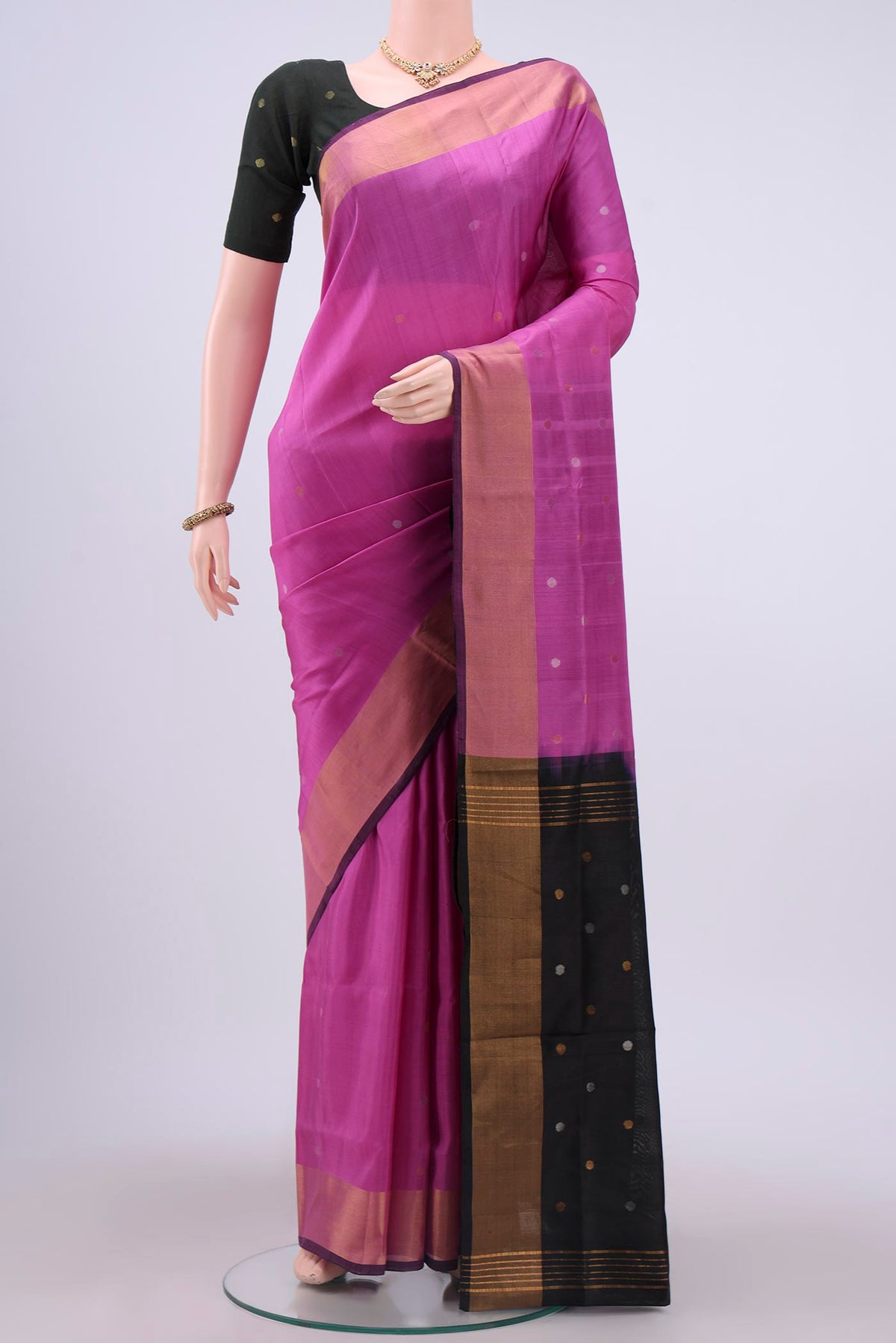 Pink Uppada Silk Saree with Zari Butta on the body and Zari Border displayed on a mannequin