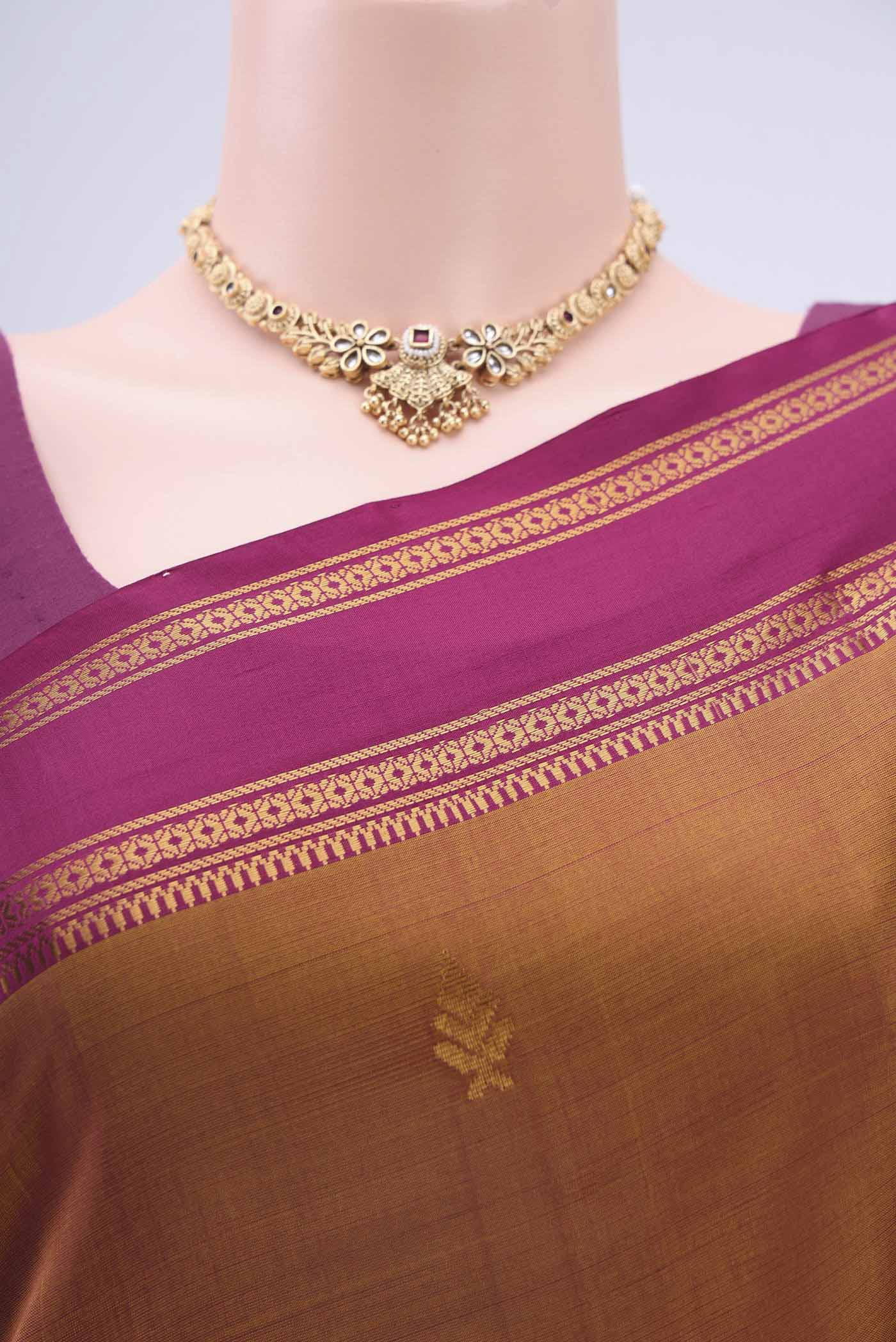 Border image of Mustard Uppada Silk Saree with Zari Butta on the body and Zari Border