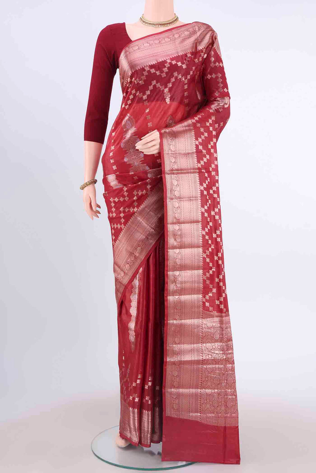 Maroon Banarasi Tussar Silk Saree with Zari Brocade on the body and Zari Border displayed on a mannequin