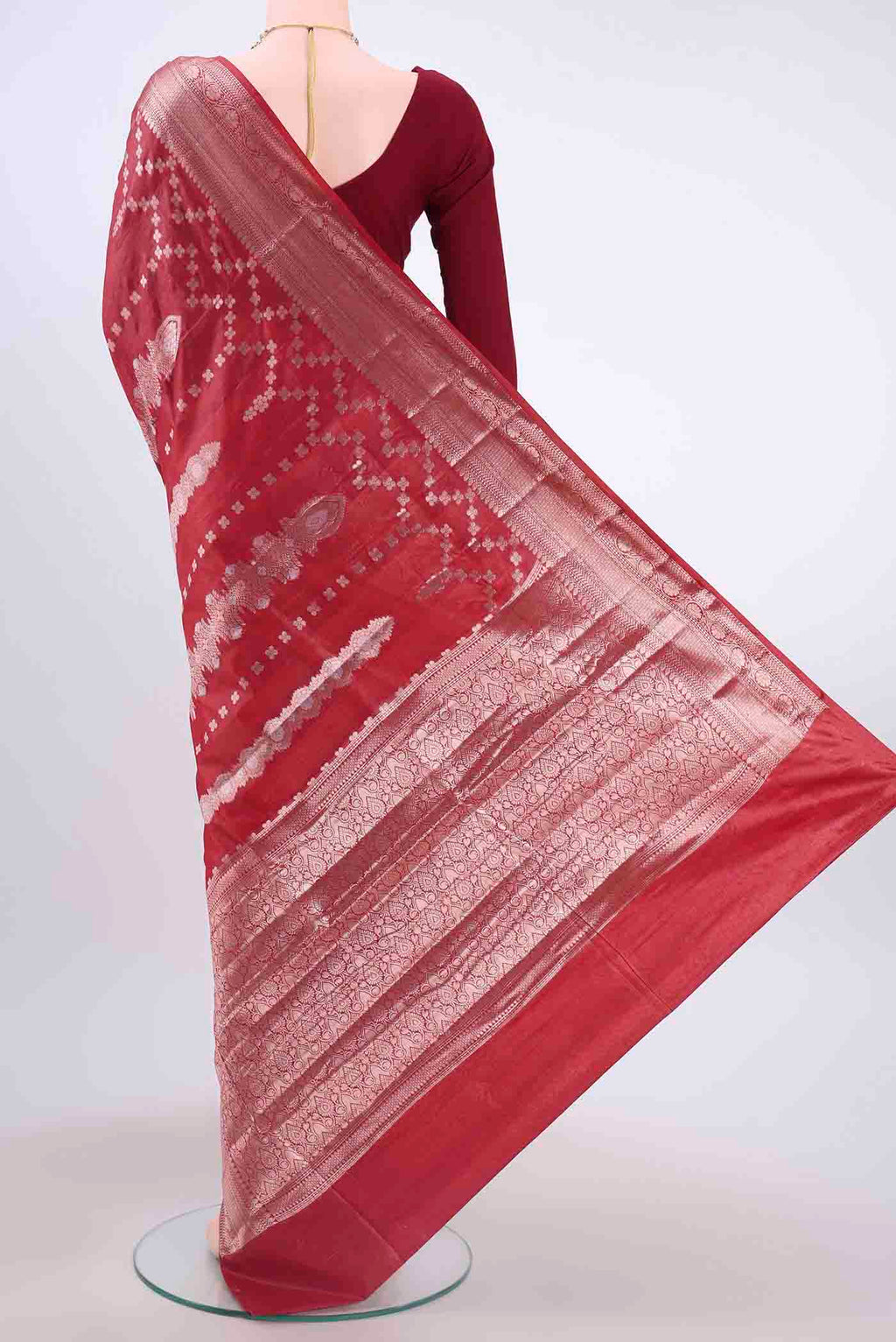Flat view of Maroon Banarasi Tussar Silk Saree with Zari Brocade on the body and Zari Border