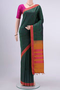 Bottle Green Kanchipuram Silk Saree with Thread Butta on the body and Thread Border displayed on a mannequin